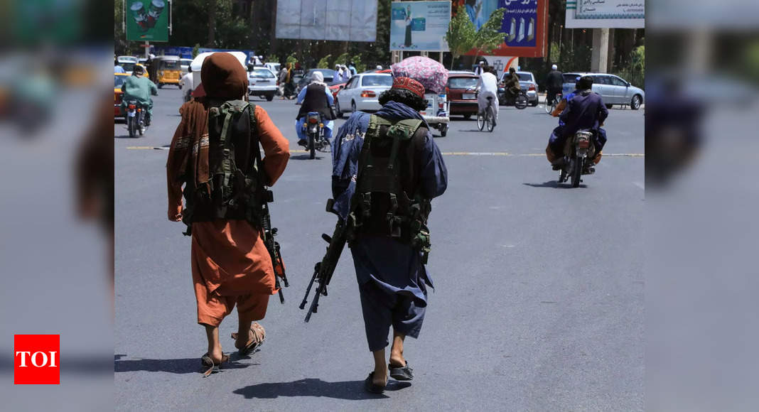 Taliban declares war is over as president and diplomats flee Kabul - Times of India
