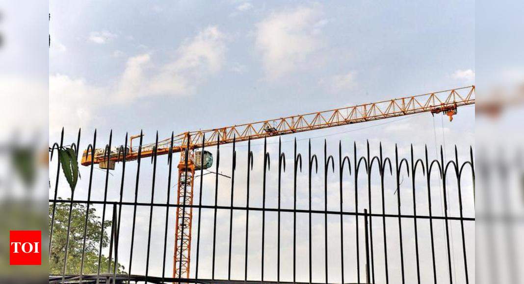 2 workers die inside embassy after portion of crane collapses | Delhi News - Times of India