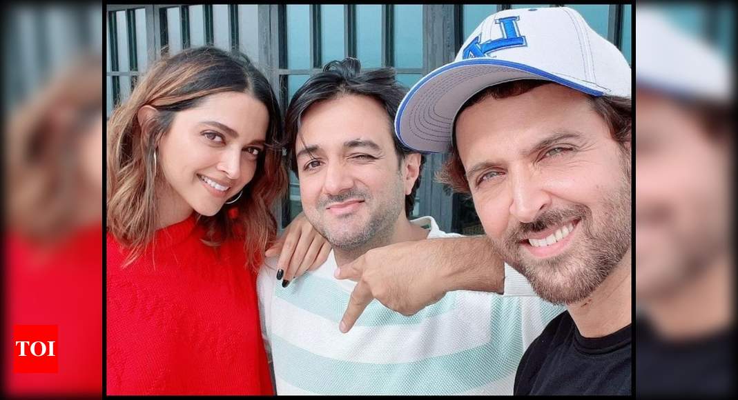 BRAND LOGOS/TOI PLUS LOGO White