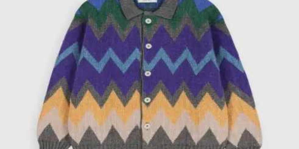 Howlin Knitwear Fashion for Styling Sweaters with Pleated Trousers